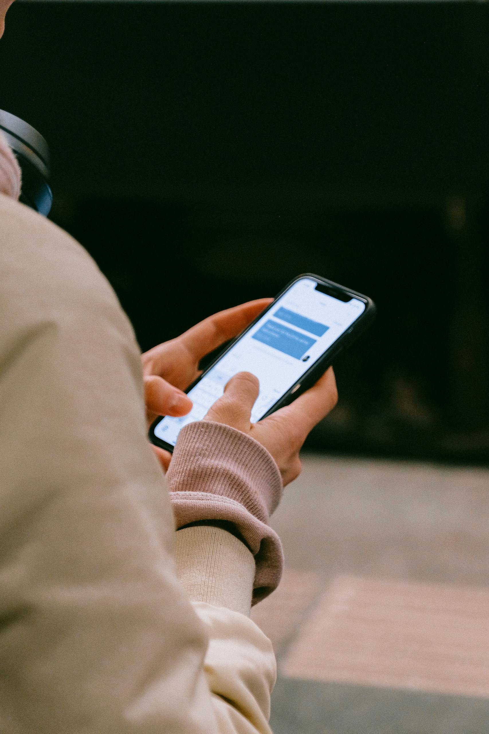 Person Holding Smartphone